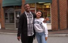Man and woman hugging and smiling at the camera